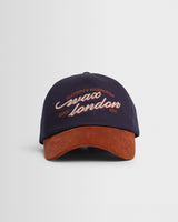 Tranton – Trucker Cap aus Cord in Marineblau und Rost