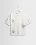 Milton - T-shirt graphique en coton biologique à motif soleil griffonné écru